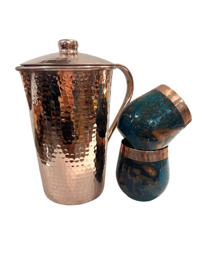 Set of One Shiny Hammered Copper Pitcher with Top and Two Blue Marbled Tumblers