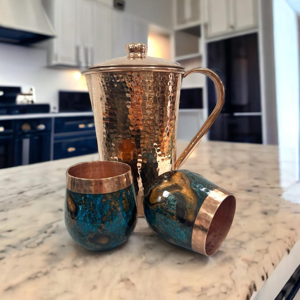 Set of One Shiny Hammered Copper Pitcher with Top and Two Blue Marbled Tumblers